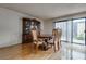 Formal dining room with hardwood floors and access to the outdoor patio at 3301 China Dr, Las Vegas, NV 89121