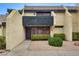 Inviting townhome featuring a private front entrance and desert landscaping at 3301 China Dr, Las Vegas, NV 89121