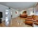 Bright living room featuring hardwood floors, neutral decor, and comfortable seating at 3301 China Dr, Las Vegas, NV 89121