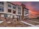 Modern townhome with multi-level design, large windows, and landscaped front yard at 3346 Esker Ridge Ave, Henderson, NV 89044