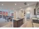 Modern kitchen features granite countertops, stainless steel appliances, and an open layout, perfect for entertaining at 3346 Esker Ridge Ave, Henderson, NV 89044