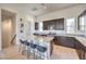 Modern kitchen offers granite countertops, stainless steel appliances, and counter seating at 3346 Esker Ridge Ave, Henderson, NV 89044