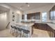 Stylish kitchen featuring granite countertops, stainless steel appliances, and a convenient breakfast bar at 3346 Esker Ridge Ave, Henderson, NV 89044
