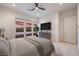 Serene main bedroom boasts a large window with city views, soft carpet, and neutral decor at 3346 Esker Ridge Ave, Henderson, NV 89044