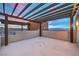 Wide outdoor patio offers a pergola, lighting, and open space for relaxation and entertainment at 3346 Esker Ridge Ave, Henderson, NV 89044