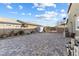 Backyard with brick pavers, landscaping, shed and gated access at 3386 W Haleh Ave, Las Vegas, NV 89141
