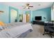 Spacious primary bedroom with desk and connecting bathroom at 3386 W Haleh Ave, Las Vegas, NV 89141