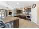 Granite countertops, stainless steel appliances, and a large island highlight this modern kitchen at 3386 W Haleh Ave, Las Vegas, NV 89141