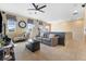 Spacious living room with ceiling fan, view and tile floors at 3386 W Haleh Ave, Las Vegas, NV 89141