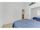 This bedroom features tile floors, neutral walls and mirrored closet doors at 3660 Renovah St # 204, Las Vegas, NV 89129