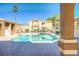Refreshing community pool with lounge chairs at 3660 Renovah St # 204, Las Vegas, NV 89129