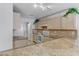 Well-lit kitchen with granite countertops, stainless steel sink, and ample cabinet space at 3660 Renovah St # 204, Las Vegas, NV 89129