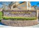 Sunhampton gated community sign with manicured landscaping at 3660 Renovah St # 204, Las Vegas, NV 89129