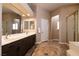 Bathroom with double sink vanity, tile flooring, and shower at 3684 Miguels Ln, Las Vegas, NV 89120