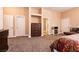 Bright bedroom featuring carpet flooring, neutral walls, and ample closet space at 3684 Miguels Ln, Las Vegas, NV 89120