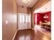 Spacious foyer showcasing wood floors and an adjacent dining area with elegant furnishings at 3684 Miguels Ln, Las Vegas, NV 89120