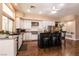 Modern kitchen with an island, stainless appliances, and ample counter space at 3684 Miguels Ln, Las Vegas, NV 89120