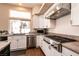Modern kitchen with stainless steel appliances, a gas range, and tile backsplash at 3684 Miguels Ln, Las Vegas, NV 89120
