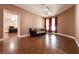 Comfortable living room with hardwood floors, neutral walls, and natural light at 3684 Miguels Ln, Las Vegas, NV 89120