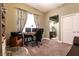 Office space with carpet flooring, desk and view into the bathroom at 3684 Miguels Ln, Las Vegas, NV 89120
