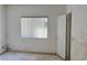 Bedroom with window and neutral walls, offering a serene space with natural light at 3761 Tohono Canyon St, Las Vegas, NV 89147