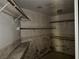 Walk-in closet with multiple shelves and a hanging rod, providing ample storage solutions at 3761 Tohono Canyon St, Las Vegas, NV 89147