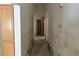 Straight hallway with neutral walls and access to multiple rooms, offering an easy transition between spaces at 3761 Tohono Canyon St, Las Vegas, NV 89147
