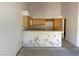 The kitchen area features abundant cabinet space and an efficient, wraparound counter design at 3761 Tohono Canyon St, Las Vegas, NV 89147