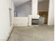 The living room features a cozy fireplace and views into the kitchen at 3761 Tohono Canyon St, Las Vegas, NV 89147
