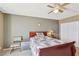 Cozy bedroom featuring a ceiling fan, natural light, and quaint furnishings at 3930 University Center Dr # 804, Las Vegas, NV 89119