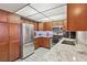 Well-equipped kitchen featuring stainless steel appliances and white countertops at 3930 University Center Dr # 804, Las Vegas, NV 89119