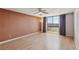 Minimalist living room showcasing spacious layout and natural light from large windows at 3930 University Center Dr # 804, Las Vegas, NV 89119