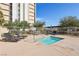 Resort-style pool and spa area with lounge chairs at 3930 University Center Dr # 804, Las Vegas, NV 89119