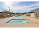Bright pool and jacuzzi area with lounge chairs at 3930 University Center Dr # 804, Las Vegas, NV 89119