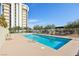 Community pool with building in background on a clear, sunny day at 3930 University Center Dr # 804, Las Vegas, NV 89119
