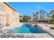 Outdoor oasis with a sparkling pool, spa, and patio area perfect for entertaining at 4024 Mansion Hall Ct, Las Vegas, NV 89129