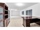 Basement with a desk, bookcase, and neutral carpet at 4024 Mansion Hall Ct, Las Vegas, NV 89129