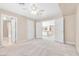 Open bedroom with ample natural light and multiple doorways to other spaces at 4024 Mansion Hall Ct, Las Vegas, NV 89129