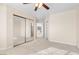 Bedroom with mirrored closet doors and light colored carpet at 4024 Mansion Hall Ct, Las Vegas, NV 89129