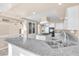 Contemporary kitchen showcasing granite countertops, a center island, and modern stainless appliances at 4024 Mansion Hall Ct, Las Vegas, NV 89129