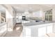 Modern kitchen with granite countertops, stainless steel appliances, and white cabinetry at 4024 Mansion Hall Ct, Las Vegas, NV 89129