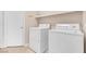 Laundry room with washer, dryer, and door at 4024 Mansion Hall Ct, Las Vegas, NV 89129
