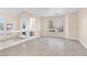 A comfortable and inviting living room with large windows, perfect for enjoying scenic views at 4024 Mansion Hall Ct, Las Vegas, NV 89129