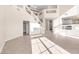 Bright and airy living space with tile flooring, high ceilings, and abundant natural light at 4024 Mansion Hall Ct, Las Vegas, NV 89129