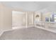 Bright living room with neutral colors and modern tile floors at 4024 Mansion Hall Ct, Las Vegas, NV 89129