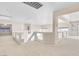 Loft area with carpet, leading to bedrooms, ample natural light at 4024 Mansion Hall Ct, Las Vegas, NV 89129