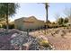 Elegant community entrance with desert landscaping and a prominent sign at 4125 Gliding Gulls Ave, North Las Vegas, NV 89084