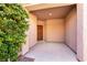 Covered front porch area with a view of the front door and surrounding landscape at 4125 Gliding Gulls Ave, North Las Vegas, NV 89084