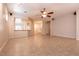 Bright living room featuring tile flooring, an open layout, and recessed lighting at 4125 Gliding Gulls Ave, North Las Vegas, NV 89084