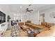 Open-concept living room with ample seating, neutral decor, and an inviting atmosphere at 4330 Flandes St, Las Vegas, NV 89121